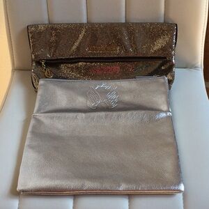 EUC (1) Silver and (1) Gold Women's Victor Secrets Clutch Bag